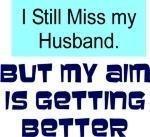 I still miss my husband. But my aim is getting better. Not getting along with your ex? This funny t-shirt lets the world know what you really feel about him.