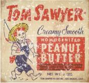 Tom Sawyer peanut butter is a vintage ad from 1945. The design has a lightly distressed look as though you've had it for years.