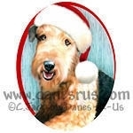 Happy Airedale Terrier is wearing his Santa Hat and ready to help you celebrate the holidays - Aire Santa says, Airey Christmas!