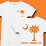 This deluxe version features an orange palmetto moon printed on the pocket area on the front and a matching palmetto on the back with the state name, South Carolina. Buy your favorite t-shirt, sweatshirt, or other clothing item.