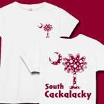Garnet Polka Dots South Cackalacky Deluxe t-shirts, apparel and gifts feature the polka dot South Carolina palmetto moon logo in garnet on the back and a smaller, matching palmetto moon on the front.