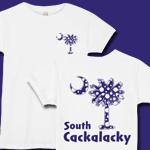 Purple Polka Dots South Cackalacky Deluxe t-shirts, apparel and gifts feature the polka dot South Carolina palmetto moon logo in purple on the back and a smaller, matching palmetto moon on the front.