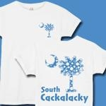 Light Blue Polka Dots South Cackalacky Deluxe t-shirts, apparel and gifts feature the polka dot South Carolina palmetto moon logo in light blue on the back and a smaller, matching palmetto moon on the front.