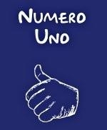 This comical attitude shirt design says loudly and clearly that you are number one. In addition to the label "Numero Uno," it shows a hand with extend thumb pointing at the wearer.