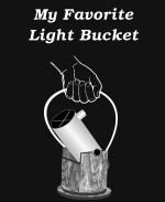 Here's a satirical astronomer t-shirt and coffee mug design for the Dobsonian telescope enthusiast. It shows a telescope being carried with a bucket handle. The caption reads: "My Favorite Light Bucket."