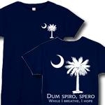 Get the South Carolina State Motto two-sided deluxe dark shirt or apparel item. It features the state motto, Dum Spiro Spero, or, While I breathe, I hope, and the palmetto moon on the back and a small palmetto moon on the front.