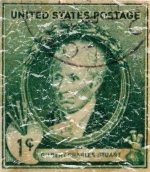 This US stamp was issued in 1940. It shows Gilbert Stewart, considered America's foremost portrait artists. His best known is the unfinished portrait of George Washington. The design has a lightly distressed appearance as though you've had it for years.